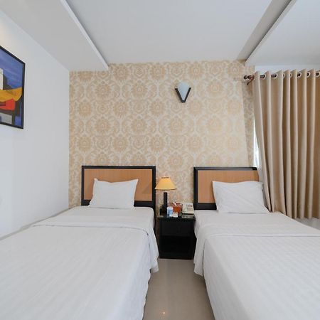 ฮวงงัน โฮเทล แอนด์ สวีท - ใจกลางเมือง Hotel โฮจิมินห์ซิตี้ ภายนอก รูปภาพ