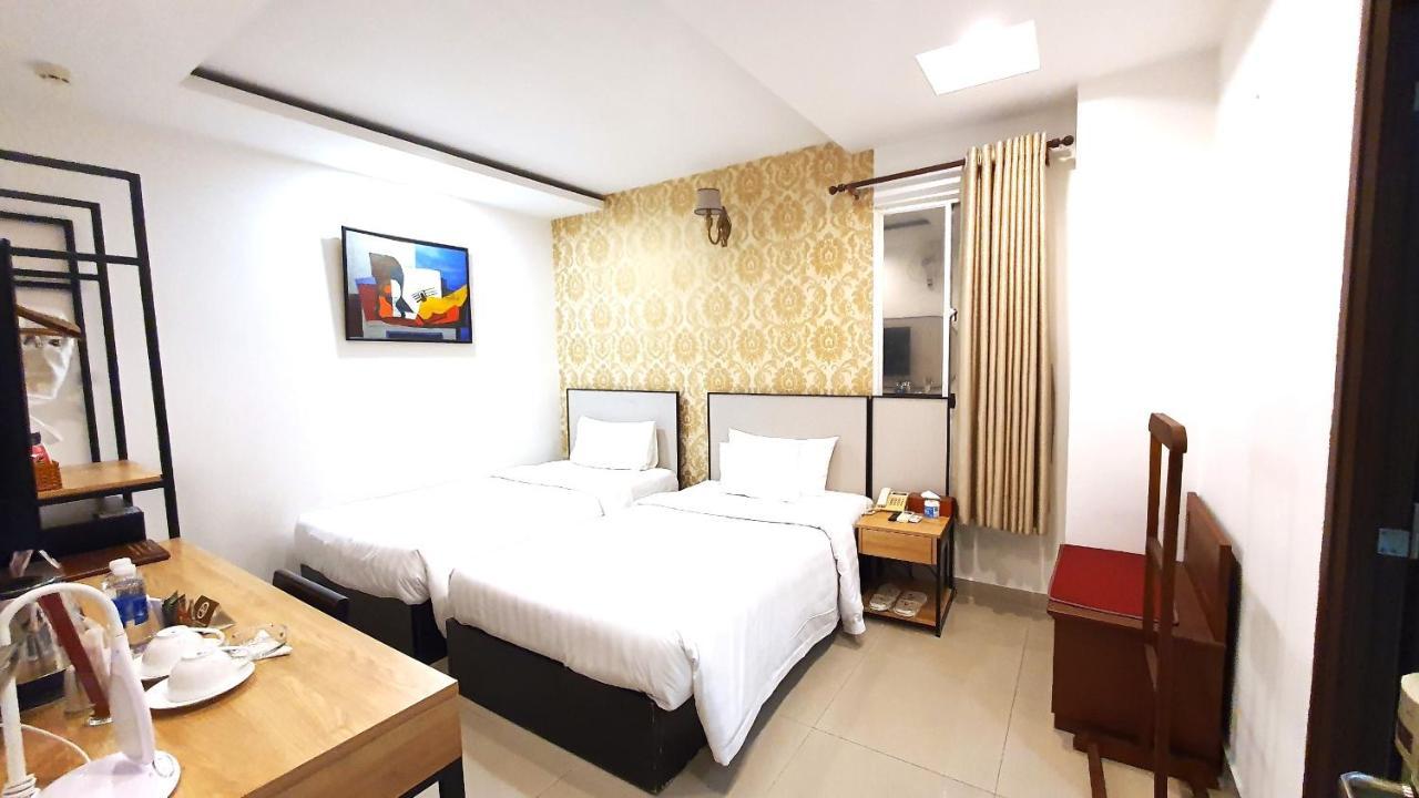 ฮวงงัน โฮเทล แอนด์ สวีท - ใจกลางเมือง Hotel โฮจิมินห์ซิตี้ ภายนอก รูปภาพ