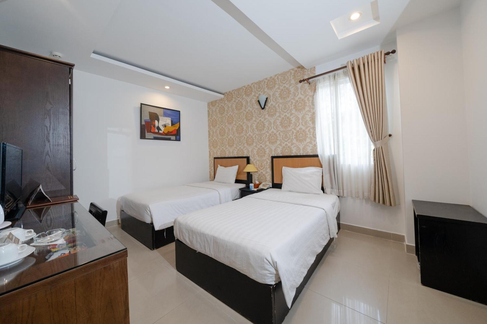 ฮวงงัน โฮเทล แอนด์ สวีท - ใจกลางเมือง Hotel โฮจิมินห์ซิตี้ ภายนอก รูปภาพ